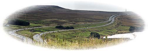 M62 Motorway snakes its way to Saddleworth Moor in The Pennines M62 Motorway snakes its way to Saddleworth Moor in The Pennines