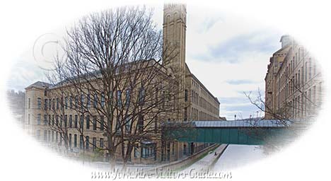 Picture of Salts Mill as it spans the Leeds Liverpool canal