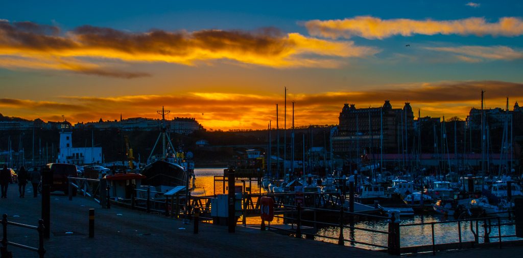 Sunset over Scarborough Harbour brings a stunning, colourful glow to the end of a beautiful, crisp winter's day in January