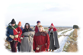 Picture of folk in medieval costume walking across the battlefield of Towton. Click the picture to read about the Battle of Towton